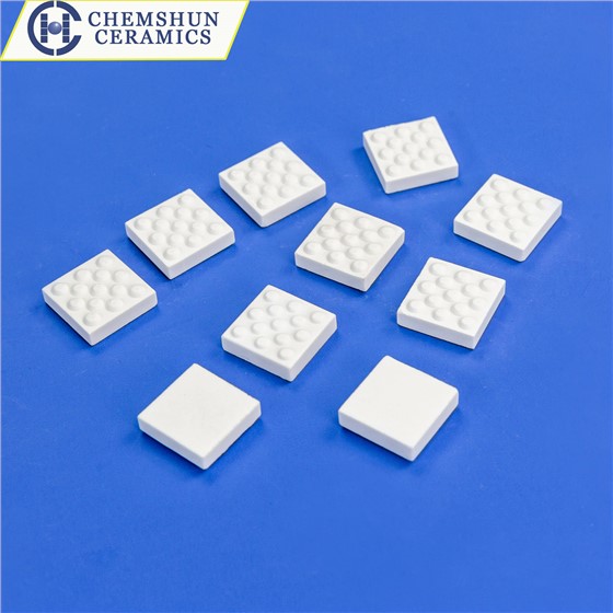 Alumina Ceramic Pieces with dimples.jpg