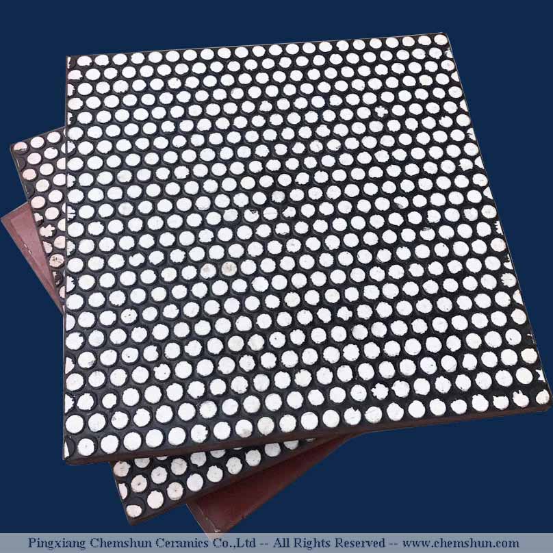 Rubber backed alumina ceramic tiles